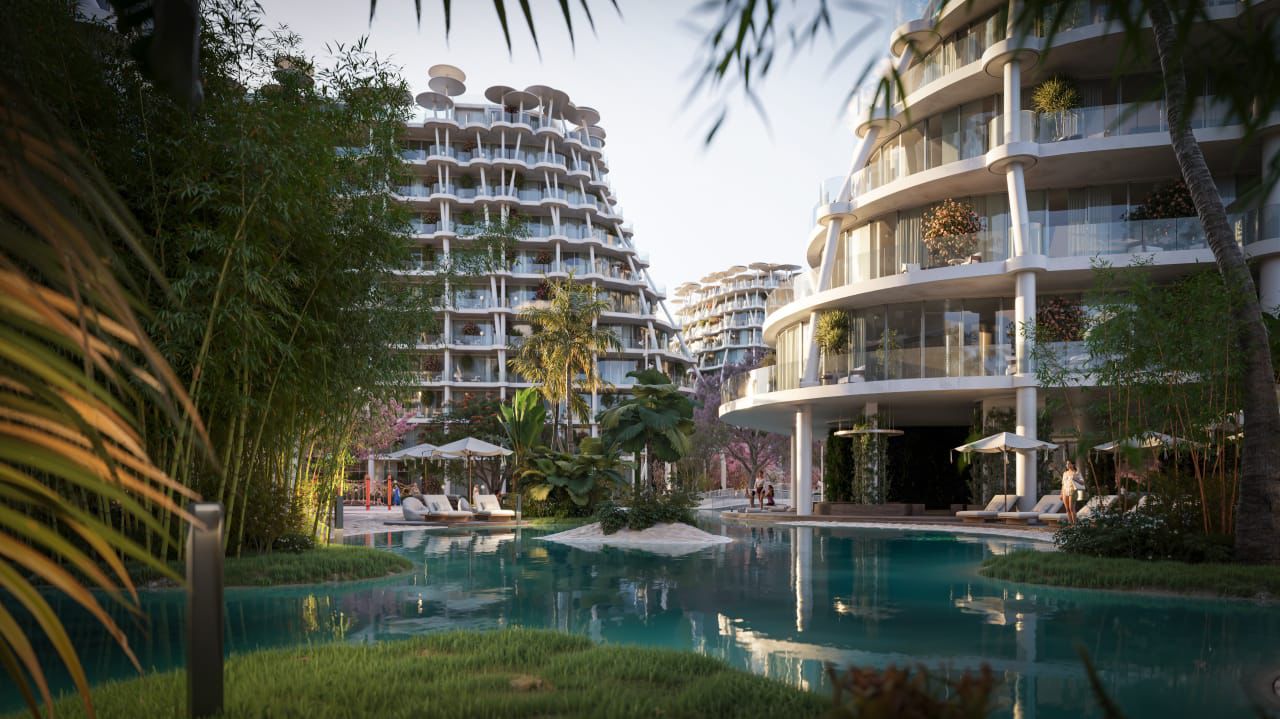Aerial view of Sakura Gardens' tiered towers around the central lagoon pool