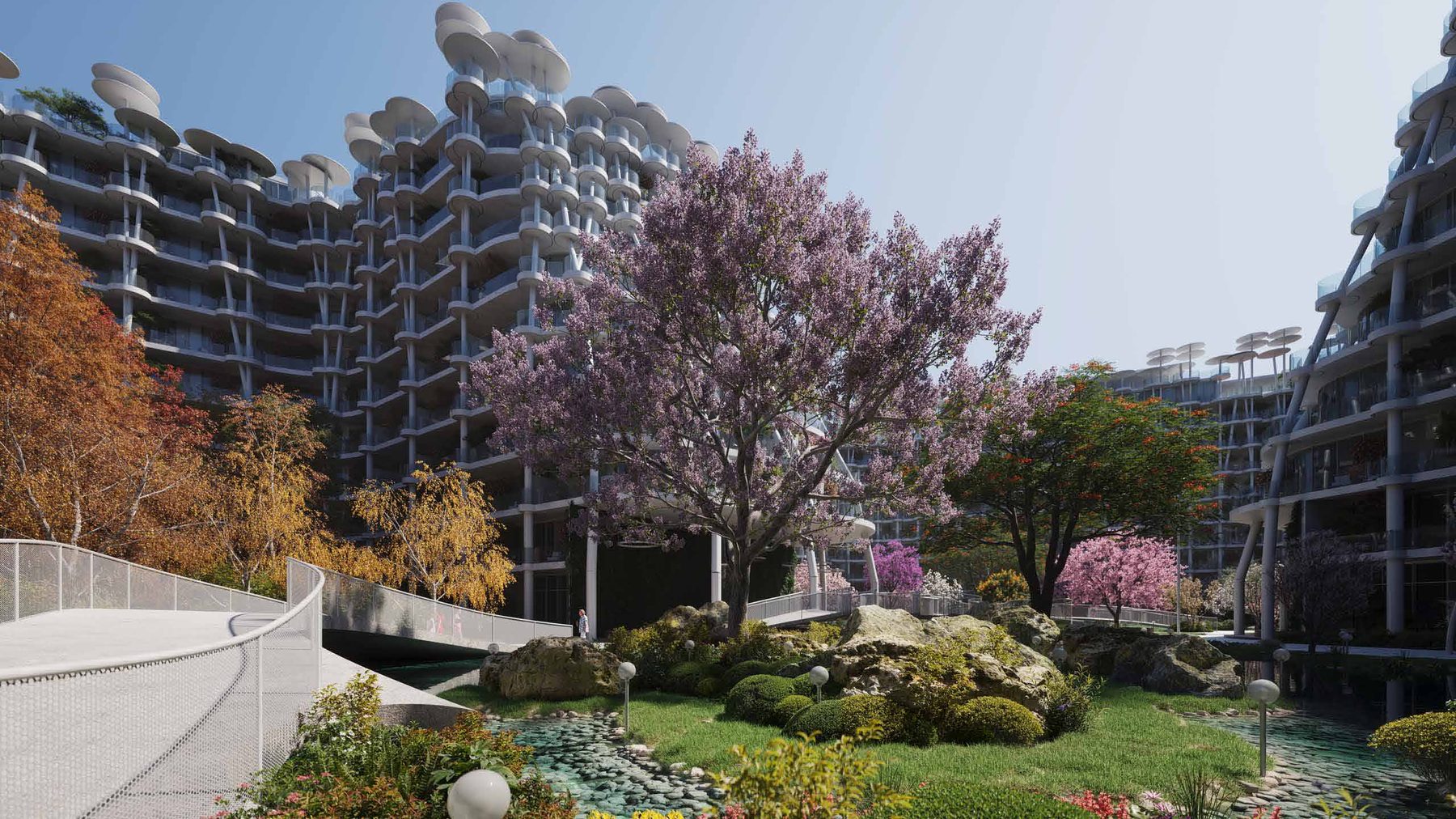 Water garden and planting at the green heart of Sakura Gardens